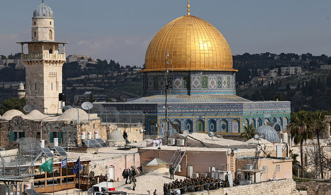 This photo, taken on February 12, 2023, shows Israeli border police forces gathering on a rooftop near the Western Wall and the Dome of the Rock mosques in Jerusalem's Al-Aqsa mosque compound. (AFP/File)
