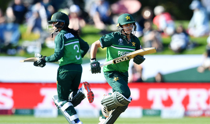 This picture, taken on March 26, 2022, Pakistan's Nida Dar (R) and Bismah Maroof run between the wickets during the 2022 Women's Cricket World Cup match between New Zealand and Pakistan at Hagley Oval in Christchurch. (Photo courtesy: AFP/File)
