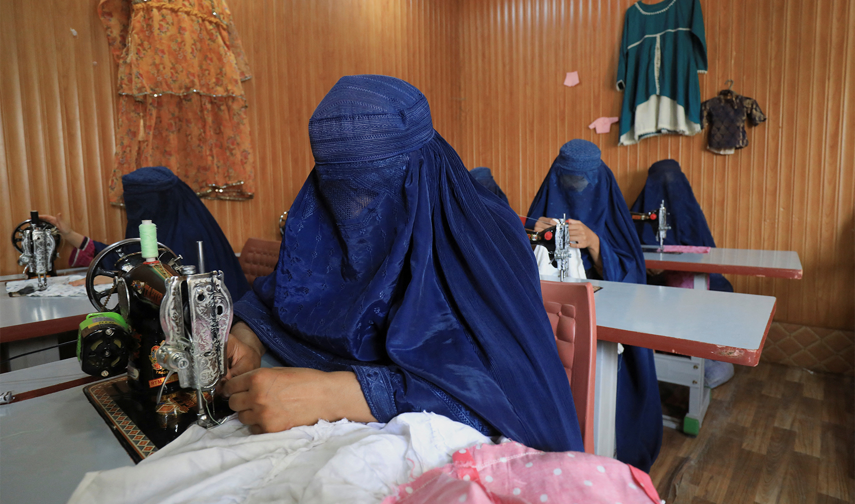 Women attend tailoring classes at the Skills Academy for Needy Aspirants (SANA) in Peshawar, Pakistan on July 12, 2023. (REUTERS)