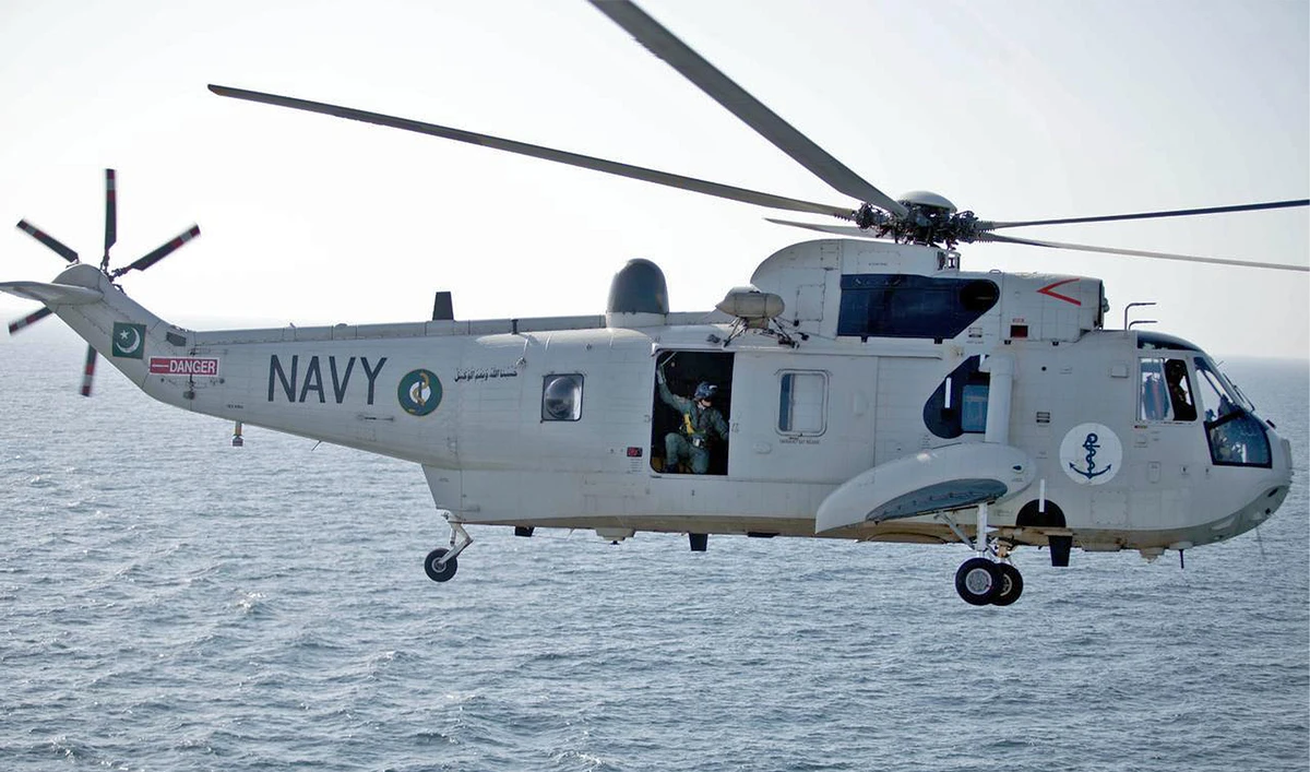 The picture shared by Pakistan Navy on September 4, 2023, shows a Pakistani Navy helicopter flying above a sea. (Photo courtesy: Pakistan Navy)