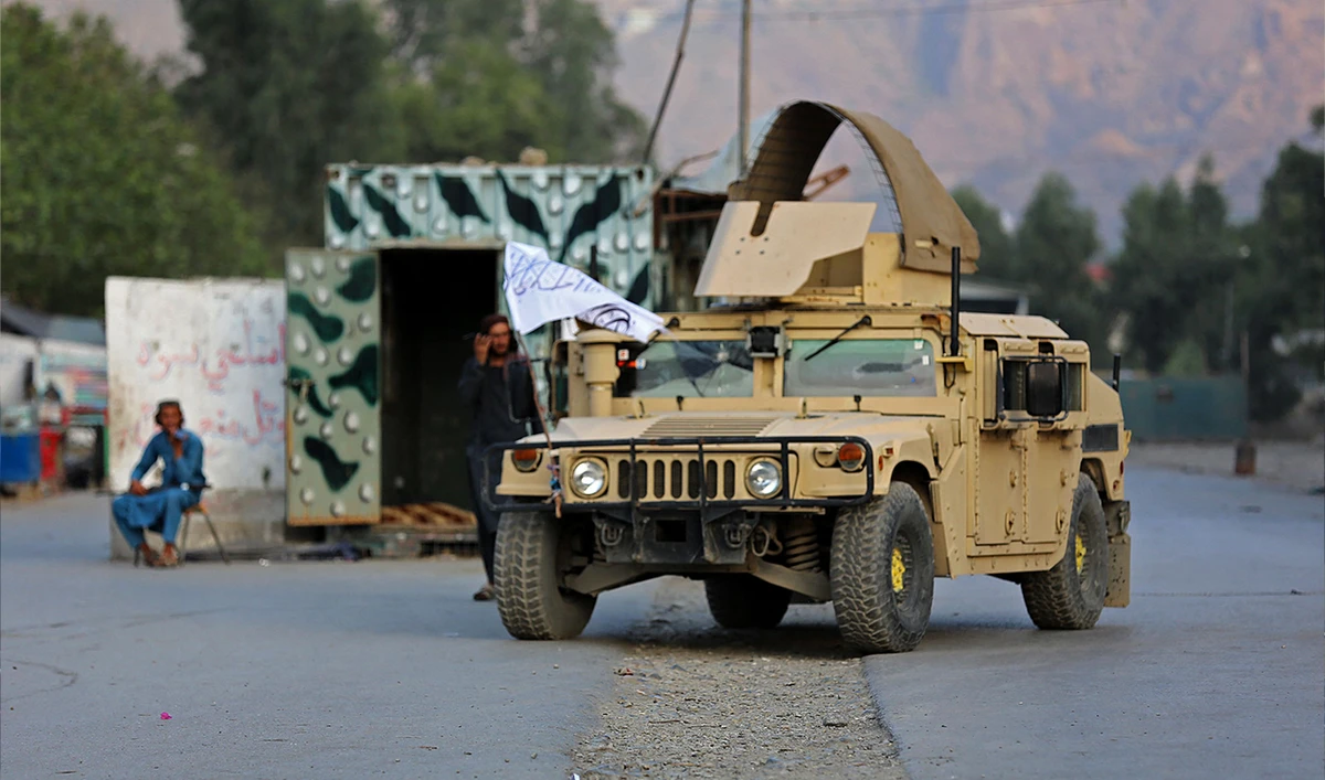 A humvee (HMMWV) vehicle is seen near the closed gates of Torkham border crossing between Afghanistan and Pakistan in Afghanistan's eastern Nangarhar province on September 6, 2023. (AFP)