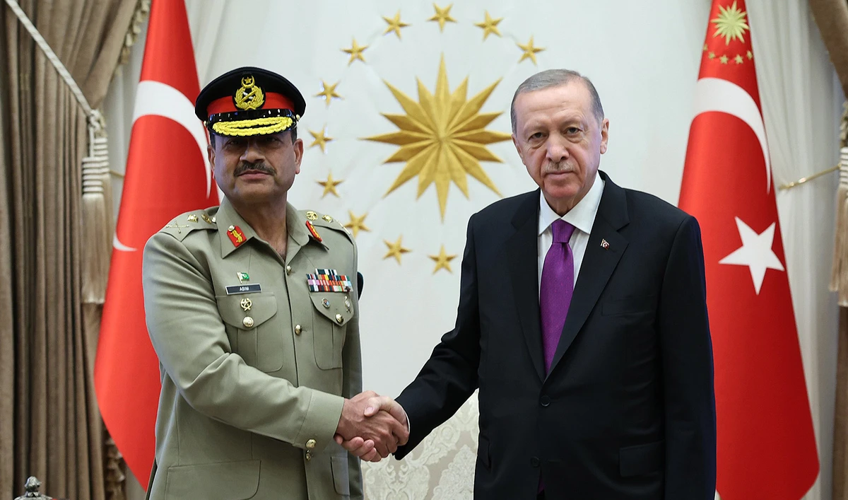 In this handout photo taken and released by Directorate of Communications Turkiye, Turkish President Recep Tayyip Erdogan (right) shakes hands with the Chief of Army Staff of Pakistan General Syed Asım Munir at the Presidential Complex in Ankara on September 13, 2023. (Photo courtesy: X/Communications)