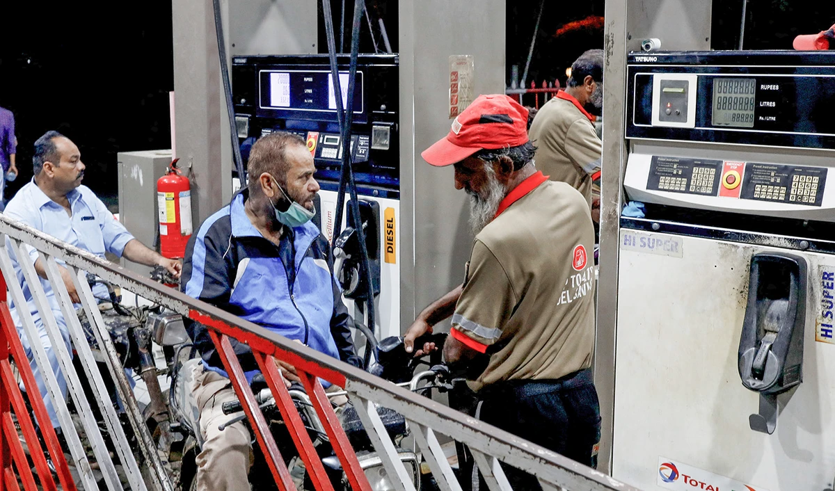 People get fuel at a petrol station after the government announced the increase of petrol and diesel prices, in Karachi, Pakistan on September 16, 2023. (REUTERS)