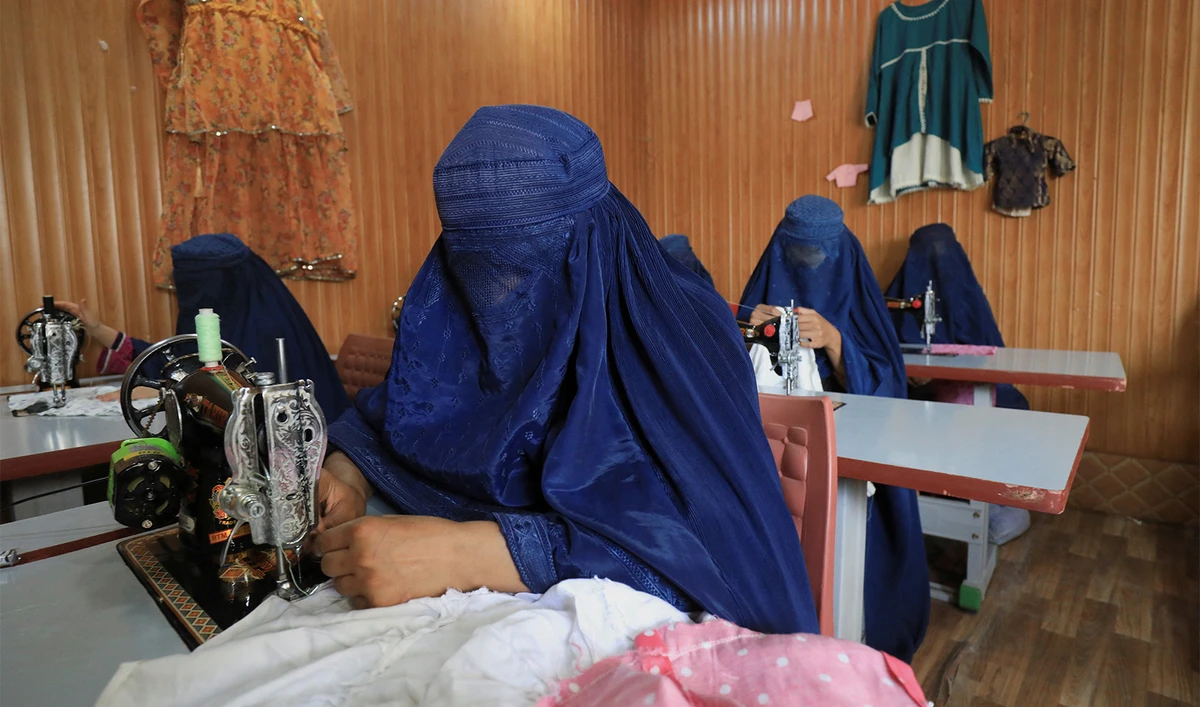 Women attend tailoring classes at the Skills Academy for Needy Aspirants (SANA) in Peshawar, Pakistan on July 12, 2023. (REUTERS)