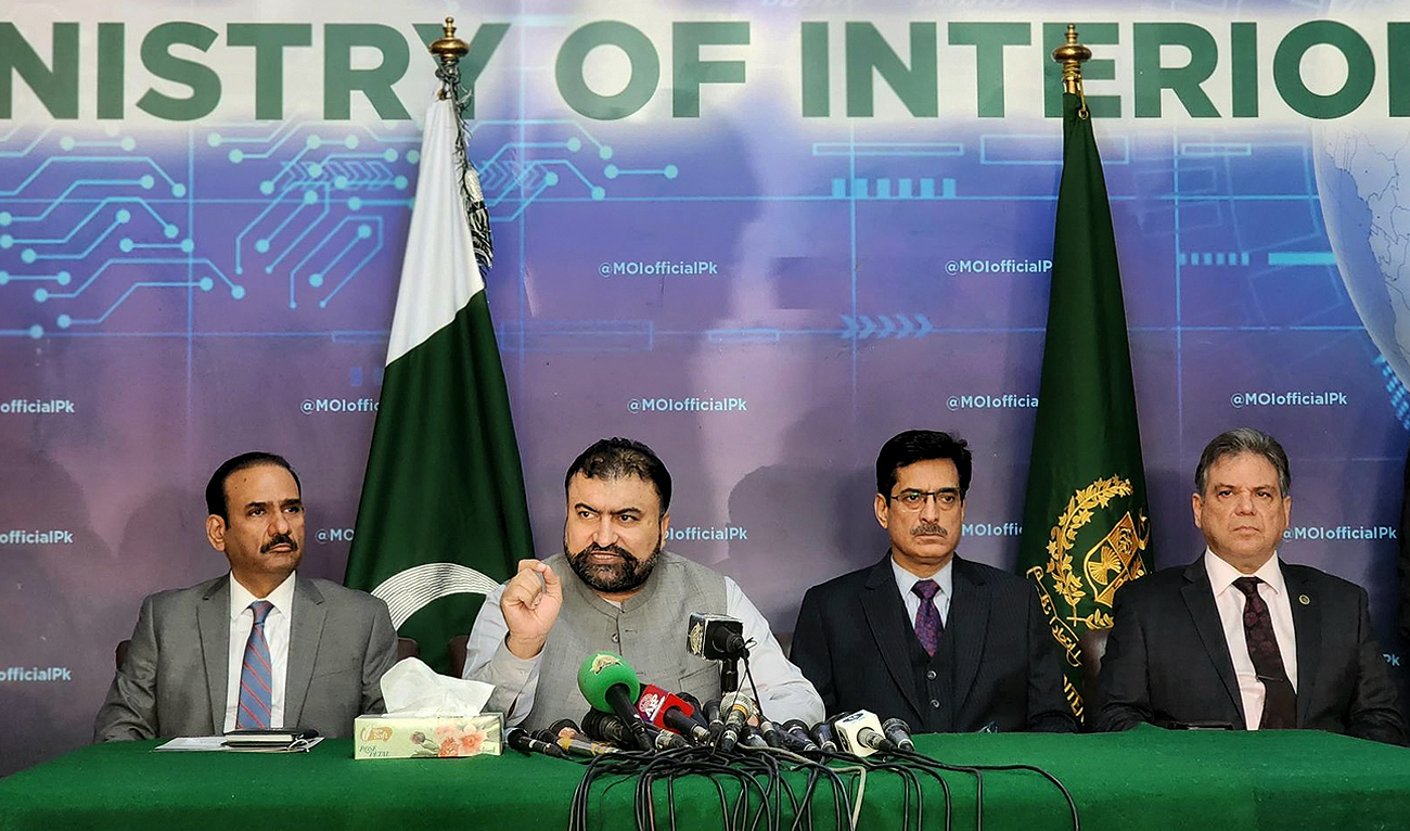 In this handout photo, taken and released by the Ministry of Interior, Caretaker Interior Minister Sarfraz Bugti speaks during a press conference in Islamabad on October 3, 2023. (Photo courtesy: X/@MoIB_Official)