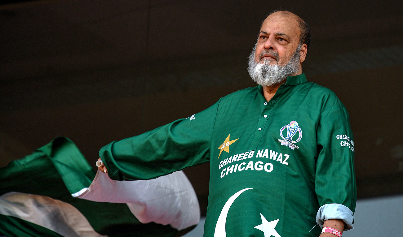 Chacha Mohammad Basheer, a Pakistani fan, waves national flag during the 2023 ICC Men's Cricket World Cup one-day international (ODI) match between Pakistan and Netherlands at the Rajiv Gandhi International Stadium in Hyderabad on October 6, 2023. (AFP)