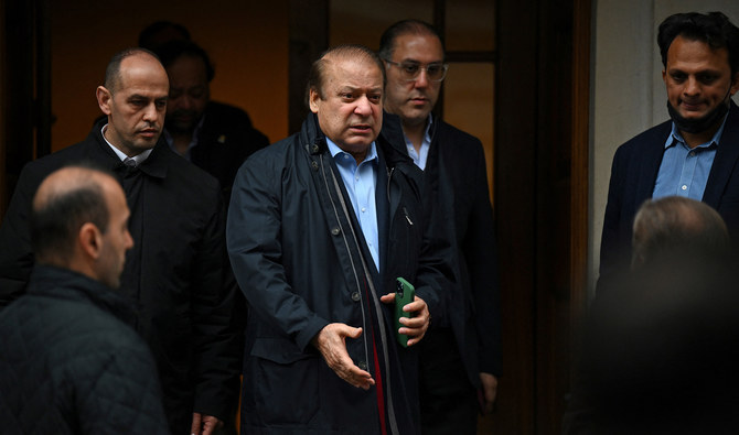 Pakistan's former Prime Minister Nawaz Sharif (3L), brother of Pakistan's current Prime Minister Shehbaz Sharif, leaves from a property in west London on May 11, 2022. (AFP/File)