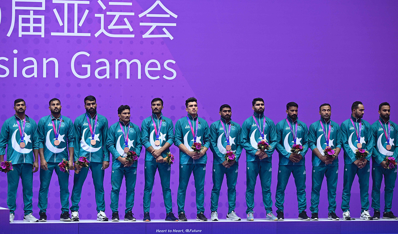 Bronze medallists Pakistan stand on the podium during the award ceremony of the men’s team kabaddi event during the 2022 Asian Games in Hangzhou in China's eastern Zhejiang province on October 7, 2023. (AFP)