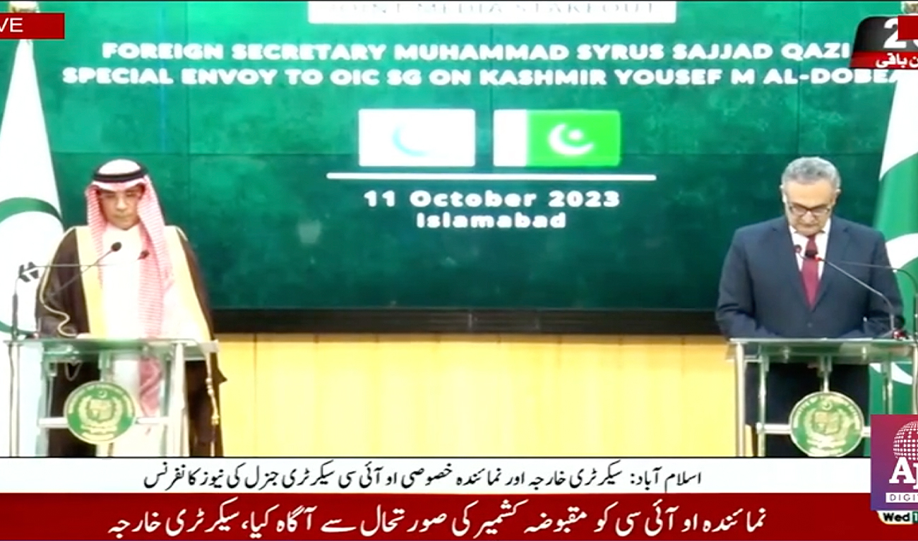 The special envoy of the Organization of Islamic Cooperation (OIC) for Jammu and Kashmir, Ambassador Yousef Al Dobeay (left), and Pakistan’s foreign secretary, Muhammad Syrus Sajjad Qazi, address a joint press conference in Islamabad, Pakistan on October 11, 2023. (Screengrab taken from the video posted by Pakistani state media)