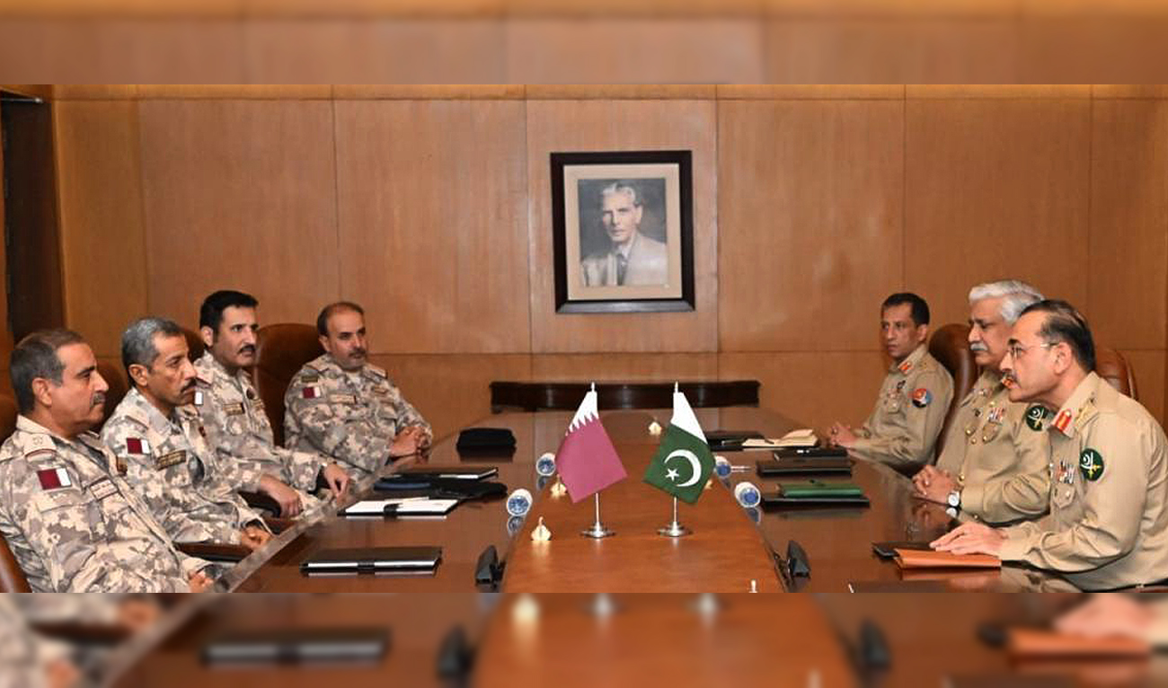 In this handout photograph, taken and released by Pakistan's Inter-Service Public Relations (ISPR) on October 12, 2023, Pakistan Army Chief General Asim Munir (1st, right) speaks during a meeting with Chief of Staff of Qatar Armed Forces Lieutenant General (Pilot) Salem Hamad Eqail Al-Nabet (1st, left) at the General Headquarters in Rawalpindi. (Photo courtesy: ISPR)