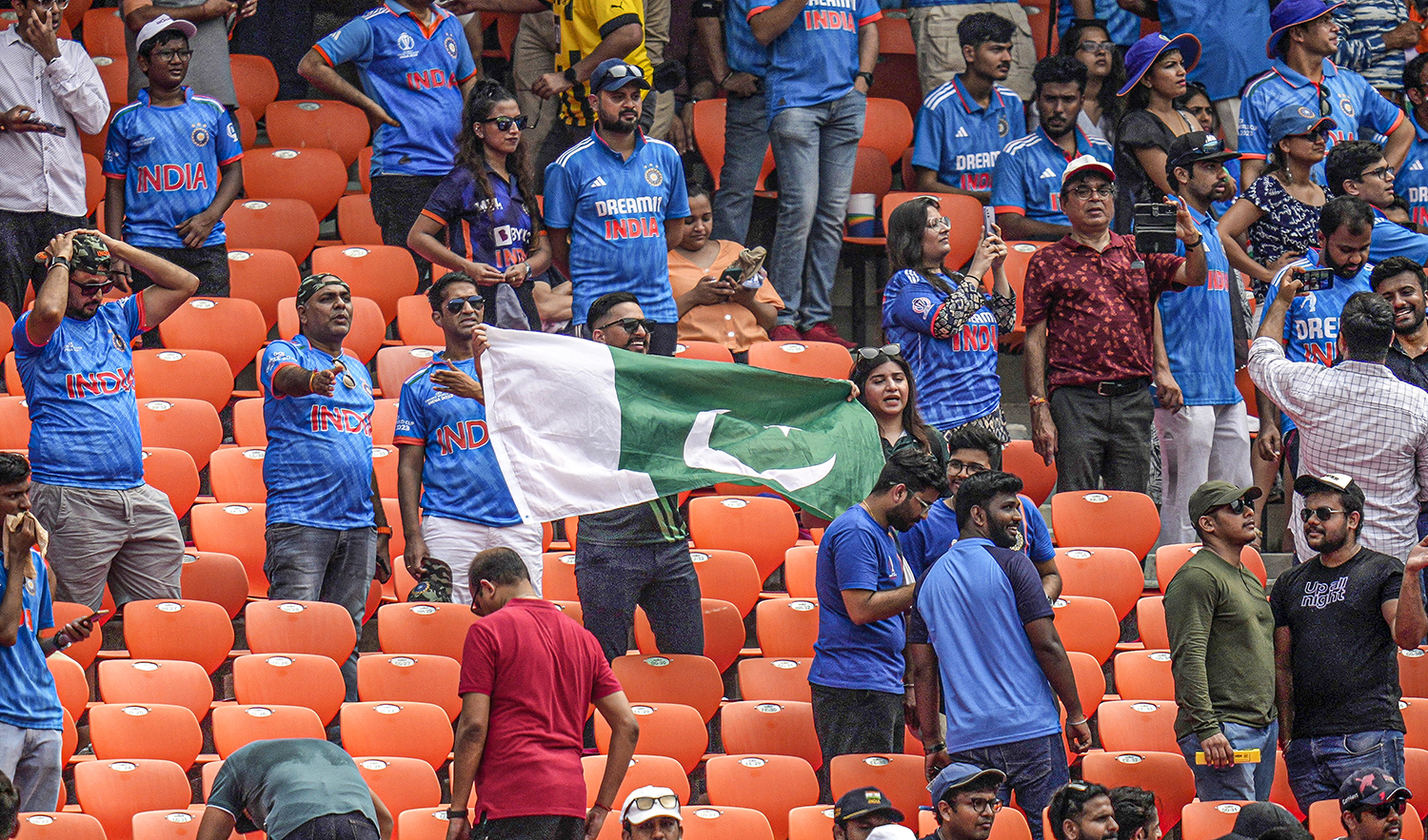 Indian and Pakistani cricket fans gather to watch the ICC Men's Cricket World Cup match between India and Pakistan in Ahmedabad, India, on October 14, 2023. (AP)