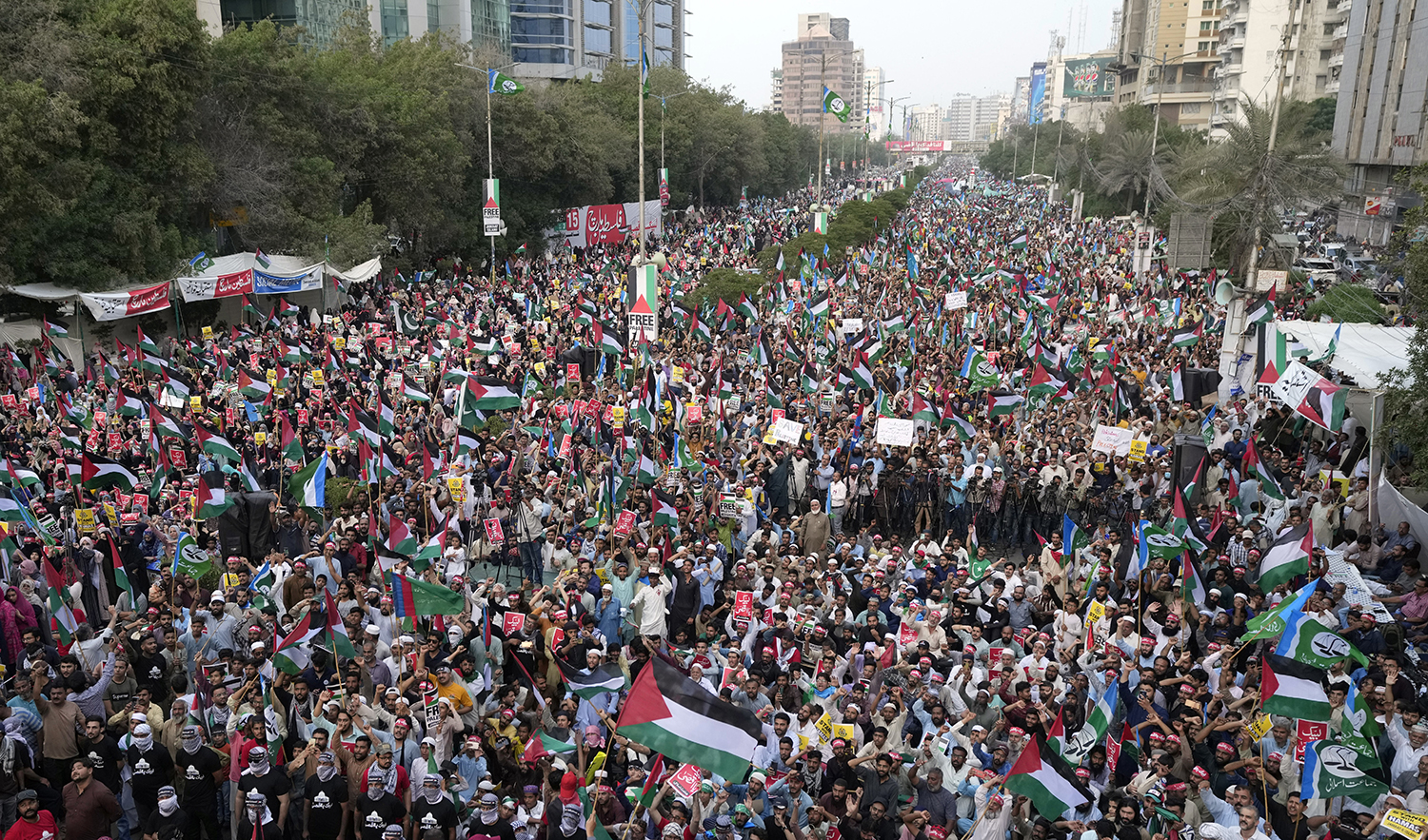 Supporters of the religious and political party Jamaat-e-Islami attend a demonstration against Israeli airstrikes on Gaza, to show solidarity with Palestinian people, in Karachi, Pakistan, on October 15, 2023. (AP)