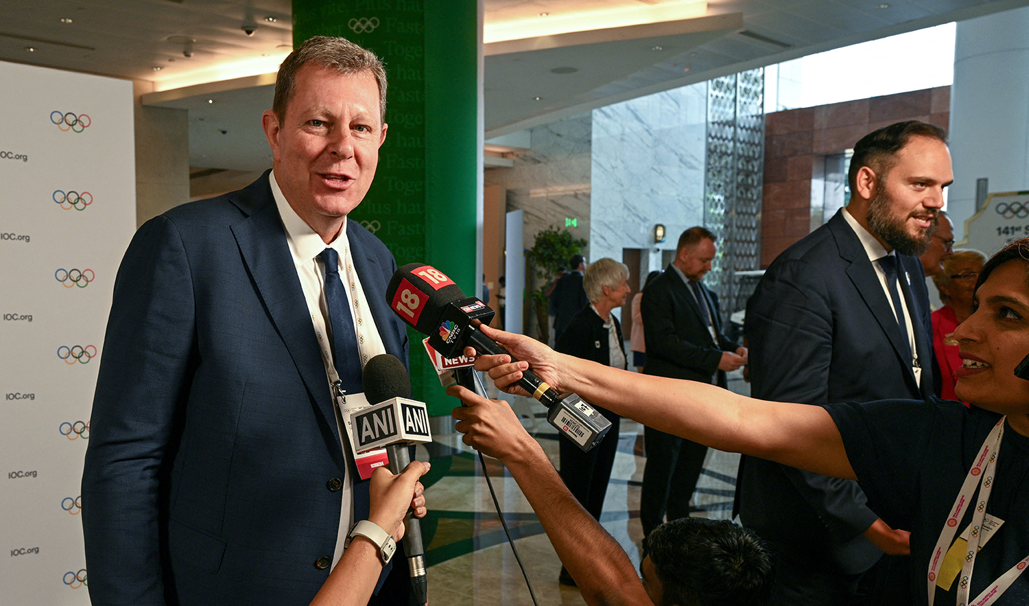 International Cricket Council (ICC) Chairman Greg Barclay (L) addresses the media after cricket was approved as an Olympic sport on the second day of the 141st session of the International Olympic Committee (IOC) in Mumbai on October 16, 2023. (AFP)