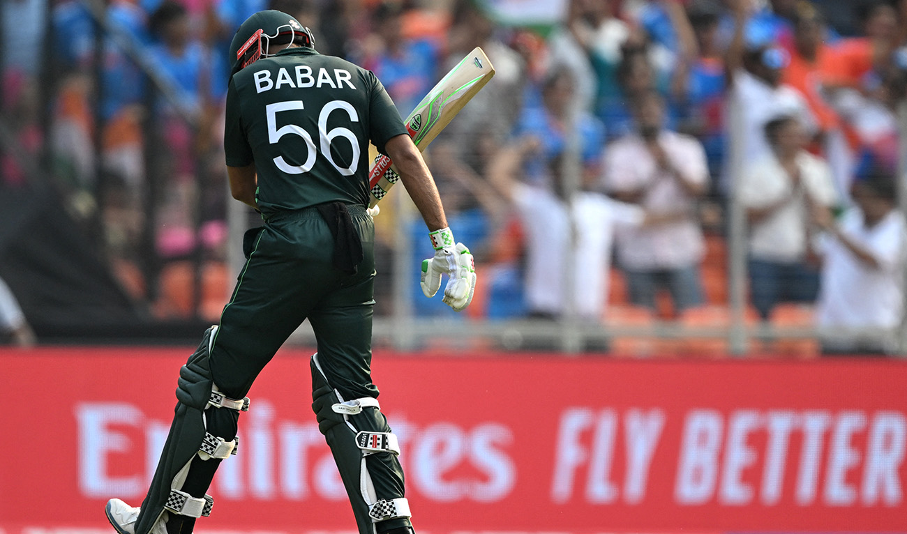 Pakistan's captain Babar Azam walks back to the pavilion after his dismissal during the 2023 ICC Men's Cricket World Cup one-day international (ODI) match between India and Pakistan at the Narendra Modi Stadium in Ahmedabad on October 14, 2023. (AFP/File)