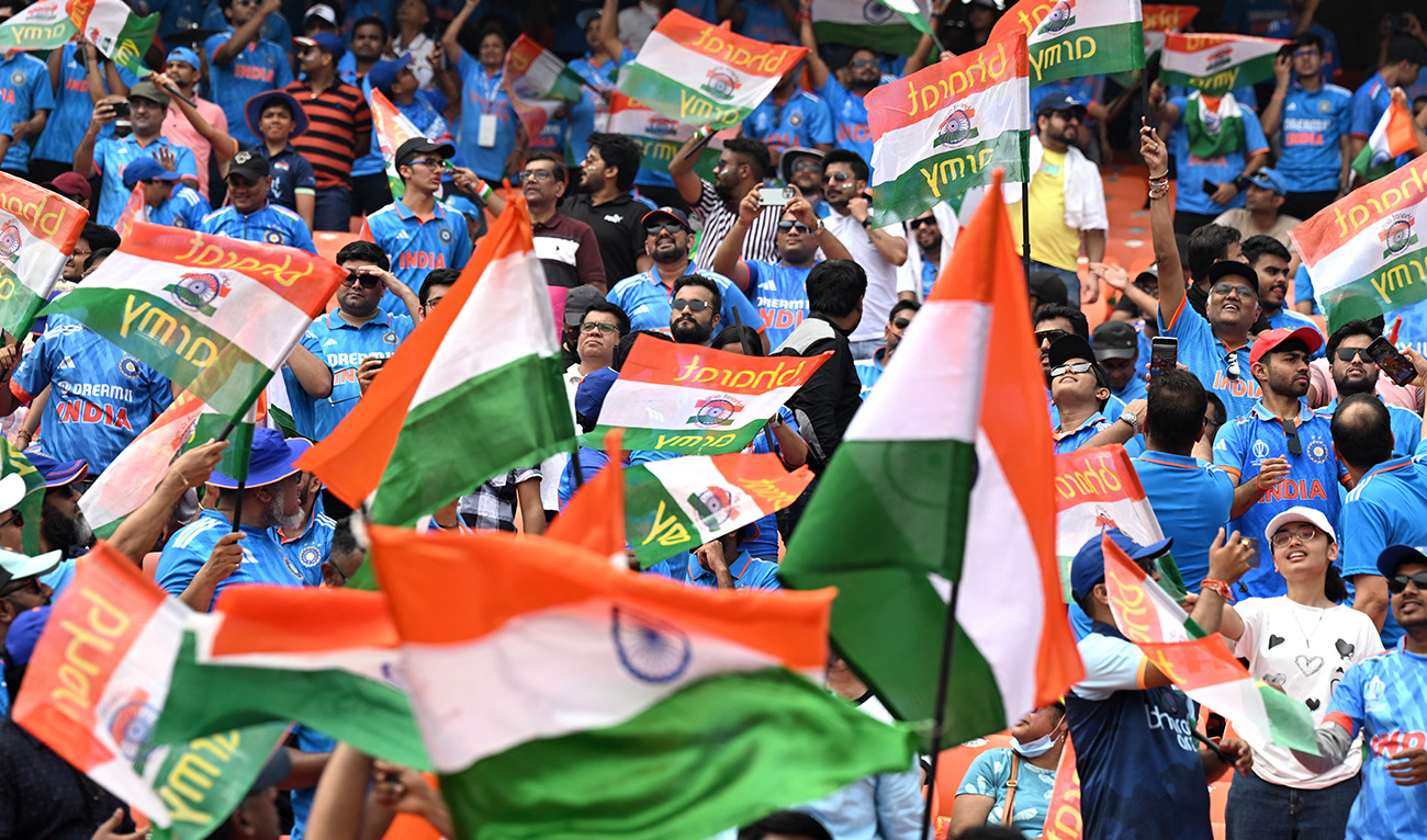 India fans cheer before the start of the 2023 ICC Men's Cricket World Cup one-day international (ODI) match between India and Pakistan at the Narendra Modi Stadium in Ahmedabad on October 14, 2023. (AFP/File)