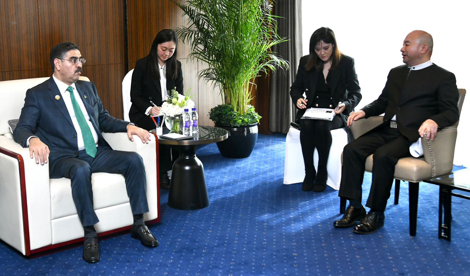 Chairman Amer International Wang Wenyin, right, calls on Pakistan's caretaker prime minister Anwaar-ul-Haq Kakar in Beijing on October 19, 2023. (PID)