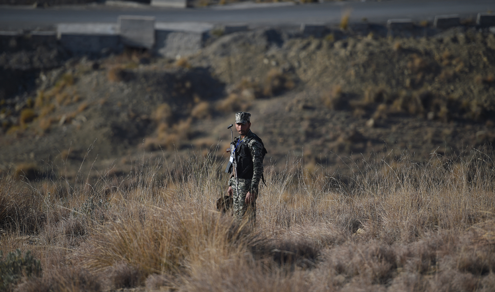 A Pakistani army soldier stands guard near a border terminal in Ghulam Khan, a town in North Waziristan, on the border between Pakistan and Afghanistan, on January 27, 2019. (AFP/File)