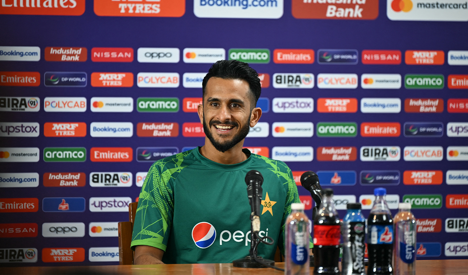 Pakistan's Hasan Ali reacts during a press conference on the eve of the 2023 ICC Men's Cricket World Cup one-day international (ODI) match between Pakistan and Australia at the M Chinnaswamy Stadium in Bengaluru, India, on October 19, 2023. (AFP)