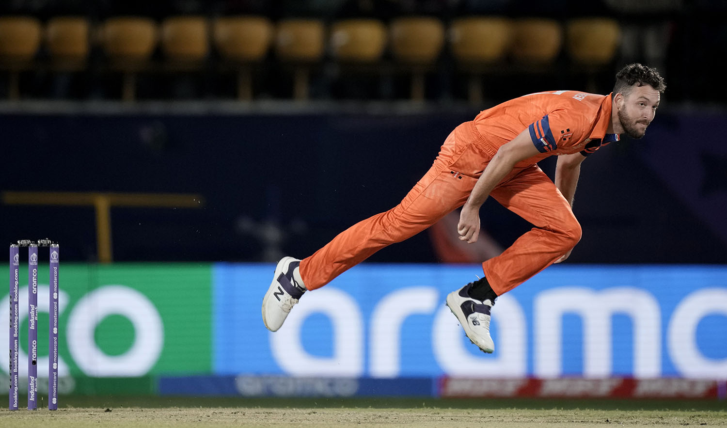 Netherlands' Paul Van Meekeren bowls during the ICC Men's Cricket World Cup match between South Africa and Netherlands in Dharamshala, India, on October 17, 2023. (AP)