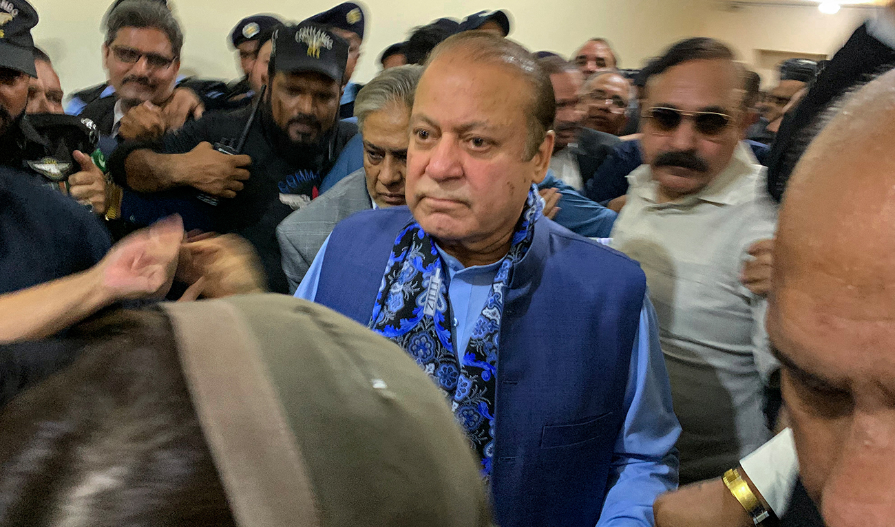 Former Pakistan’s Prime Minister and graft convict Nawaz Sharif (C) arrives to appear before the court in Islamabad on October 24, 2023. (AFP)
