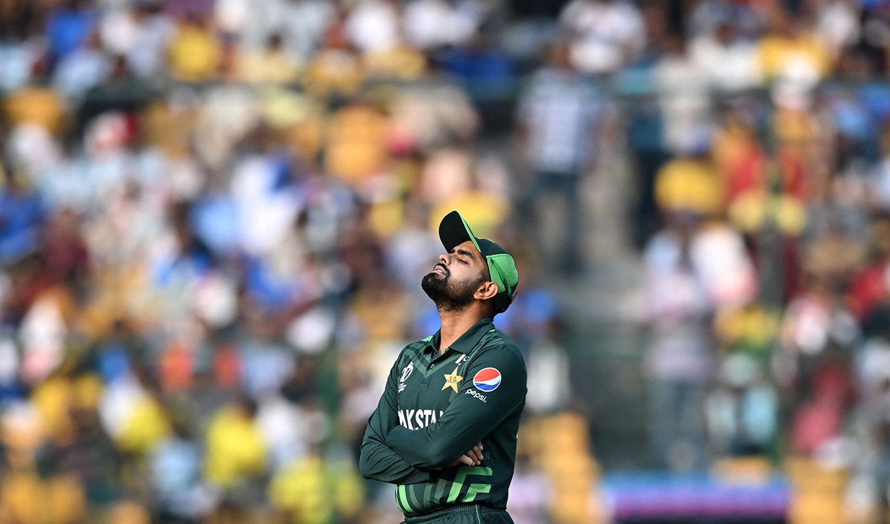 Pakistan's captain Babar Azam reacts while fielding during the 2023 ICC Men's Cricket World Cup one-day international (ODI) match between Australia and Pakistan at the M. Chinnaswamy Stadium in Bengaluru on October 20, 2023. (AFP/File)