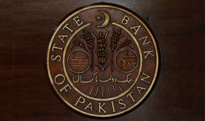 A logo of the State Bank of Pakistan (SBP) is pictured on a reception desk at the head office in Karachi, Pakistan on July 16, 2019. (REUTERS/File)