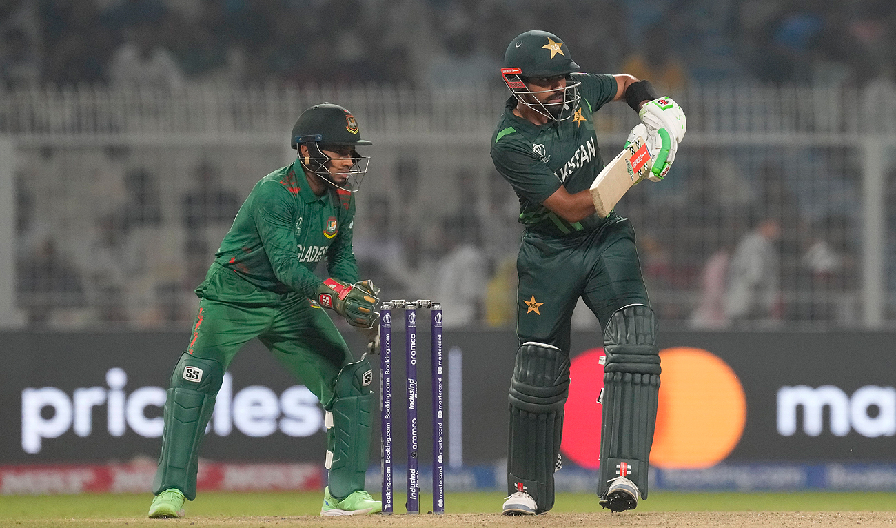 Pakistan's captain Babar Azam plays a shot during the ICC Men's Cricket World Cup match between Bangladesh and Pakistan in Kolkata, India, Tuesday, Oct. 31, 2023. (AP)