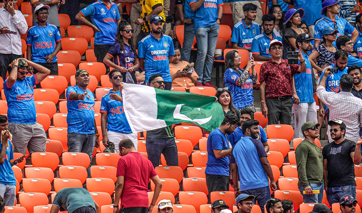 Indian and Pakistani cricket fans gather to watch the ICC Men's Cricket World Cup match between India and Pakistan in Ahmedabad, India, on October 14, 2023. (AP)