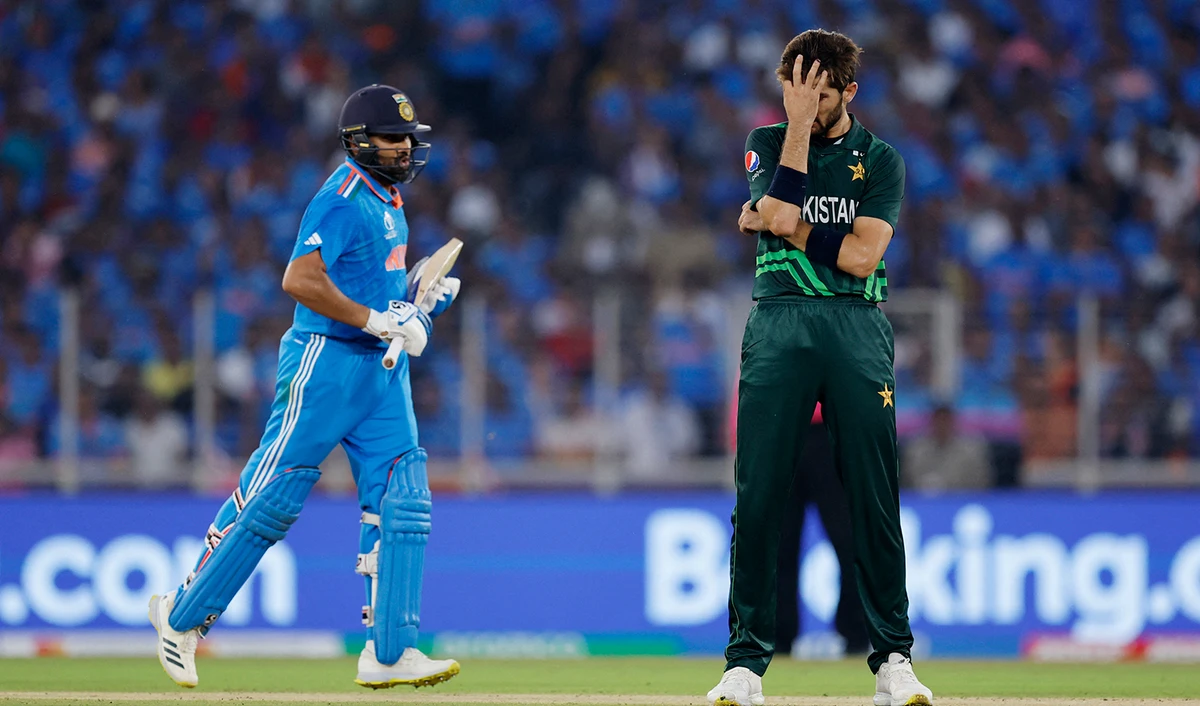 Pakistan's Shaheen Afridi reacts as India's Rohit Sharma runs between the wickets during an ICC Cricket World Cup 2023 match at the Narendra Modi Stadium in Ahmedabad, India on October 14, 2023. (REUTERS)
