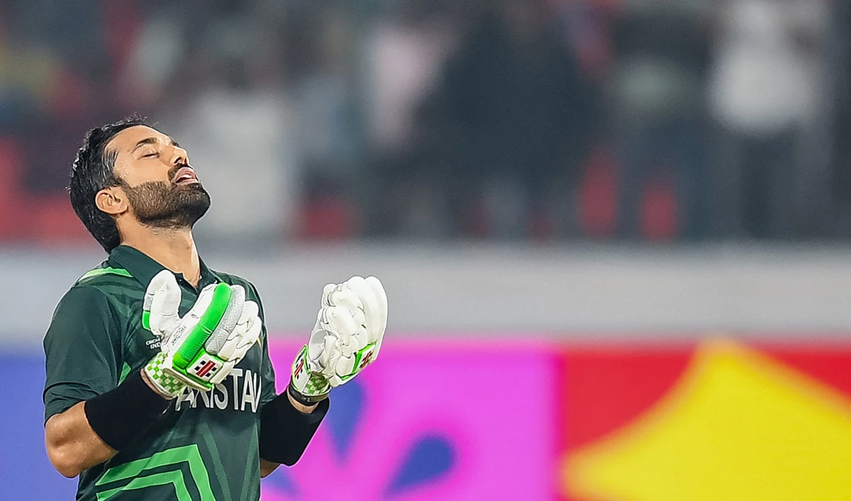Pakistan's Mohammad Rizwan celebrates after scoring a century (100 runs) during the 2023 ICC Men's Cricket World Cup one-day international (ODI) match between Pakistan and Sri Lanka at the Rajiv Gandhi International Stadium in Hyderabad on October 10, 2023. (AFP)