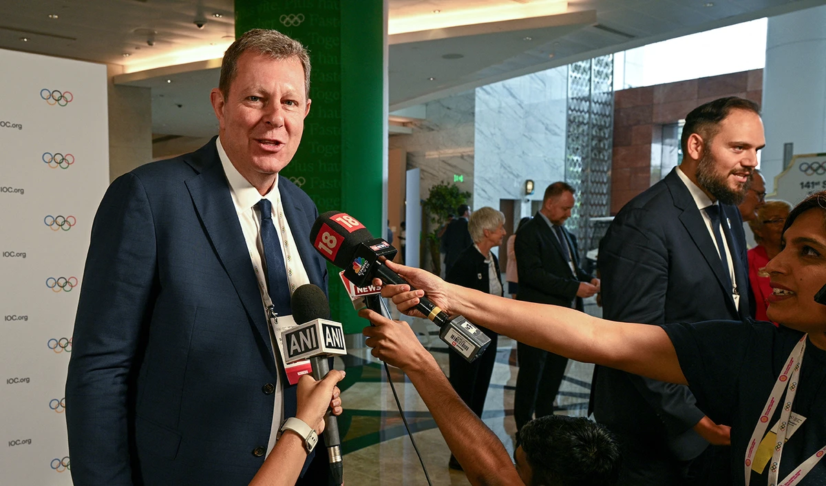International Cricket Council (ICC) Chairman Greg Barclay (L) addresses the media after cricket was approved as an Olympic sport on the second day of the 141st session of the International Olympic Committee (IOC) in Mumbai on October 16, 2023. (AFP)