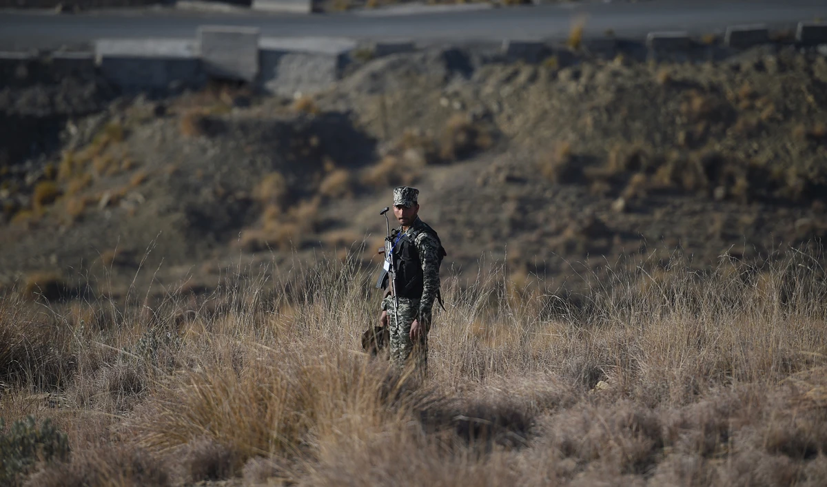 A Pakistani army soldier stands guard near a border terminal in Ghulam Khan, a town in North Waziristan, on the border between Pakistan and Afghanistan, on January 27, 2019. (AFP/File)