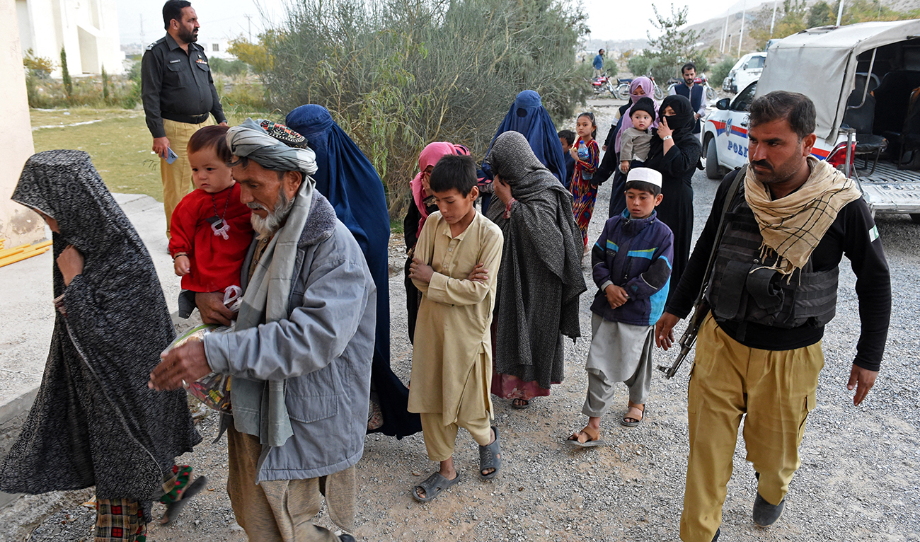 Afghan refugees amassed from different parts of Quetta, arrive at a camp before their deportation to Afghanistan on November 1, 2023. (AFP)