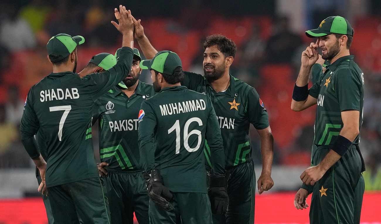 Pakistani players celebrates the dismissal of Netherlands' Teja Nidamanuru during the ICC Men's Cricket World Cup match between Pakistan and Netherlands in Hyderabad, India on October 6, 2023. (AP)
