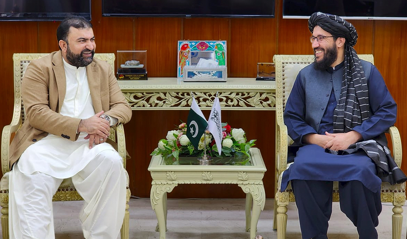 Pakistan's Caretaker Interior Minister Sarfraz Bugti (left) gestures during a meeting with Afghanistan’s ambassador Sardar Ahmad Shakib in Islamabad on November 2, 2023. (Photo courtesy: X/@MOIofficialGoP)