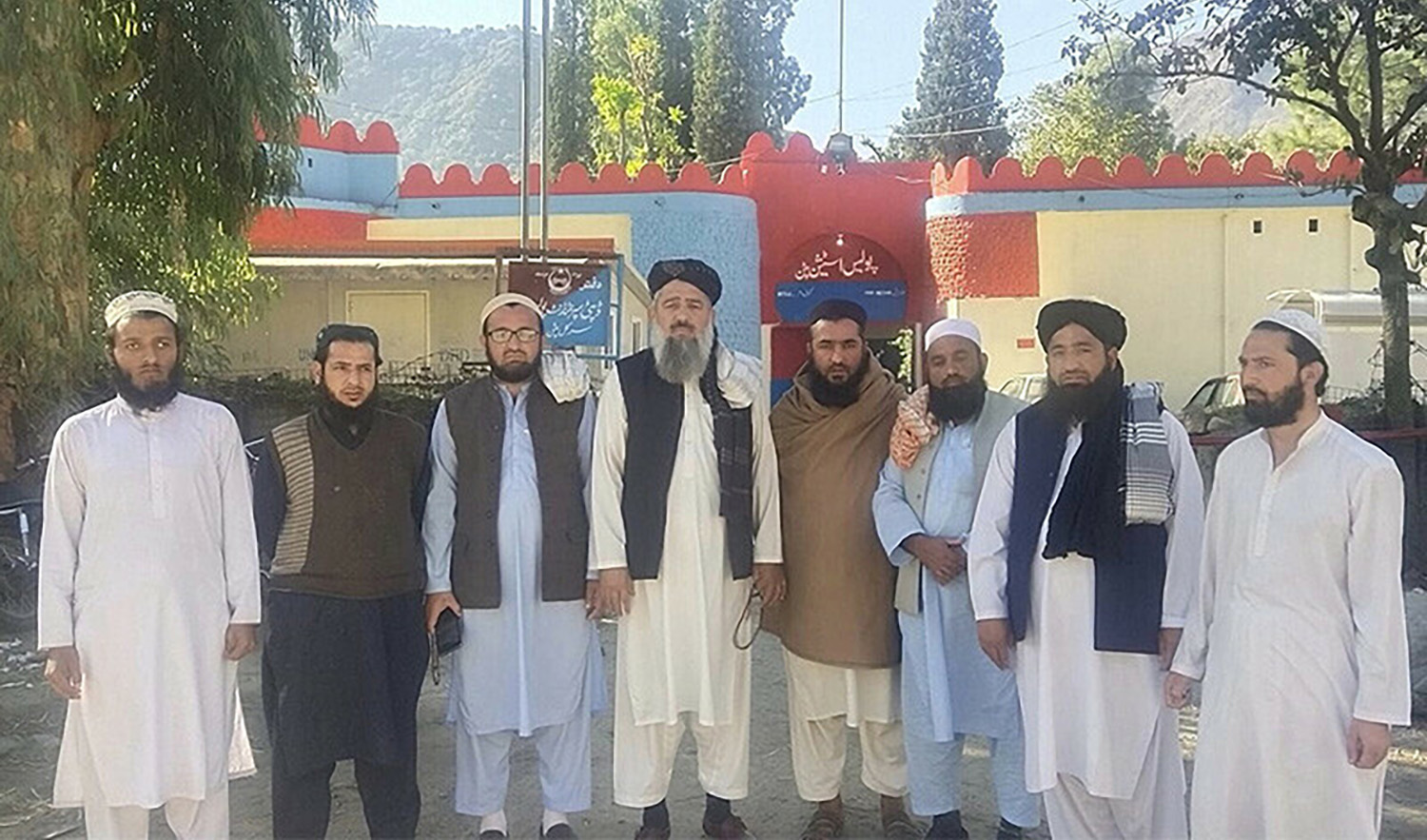A group of religious figures outside a police station in Kohistan in a photo posted on Saturday. (Photo courtesy: Molana Karimdad/Facebook)