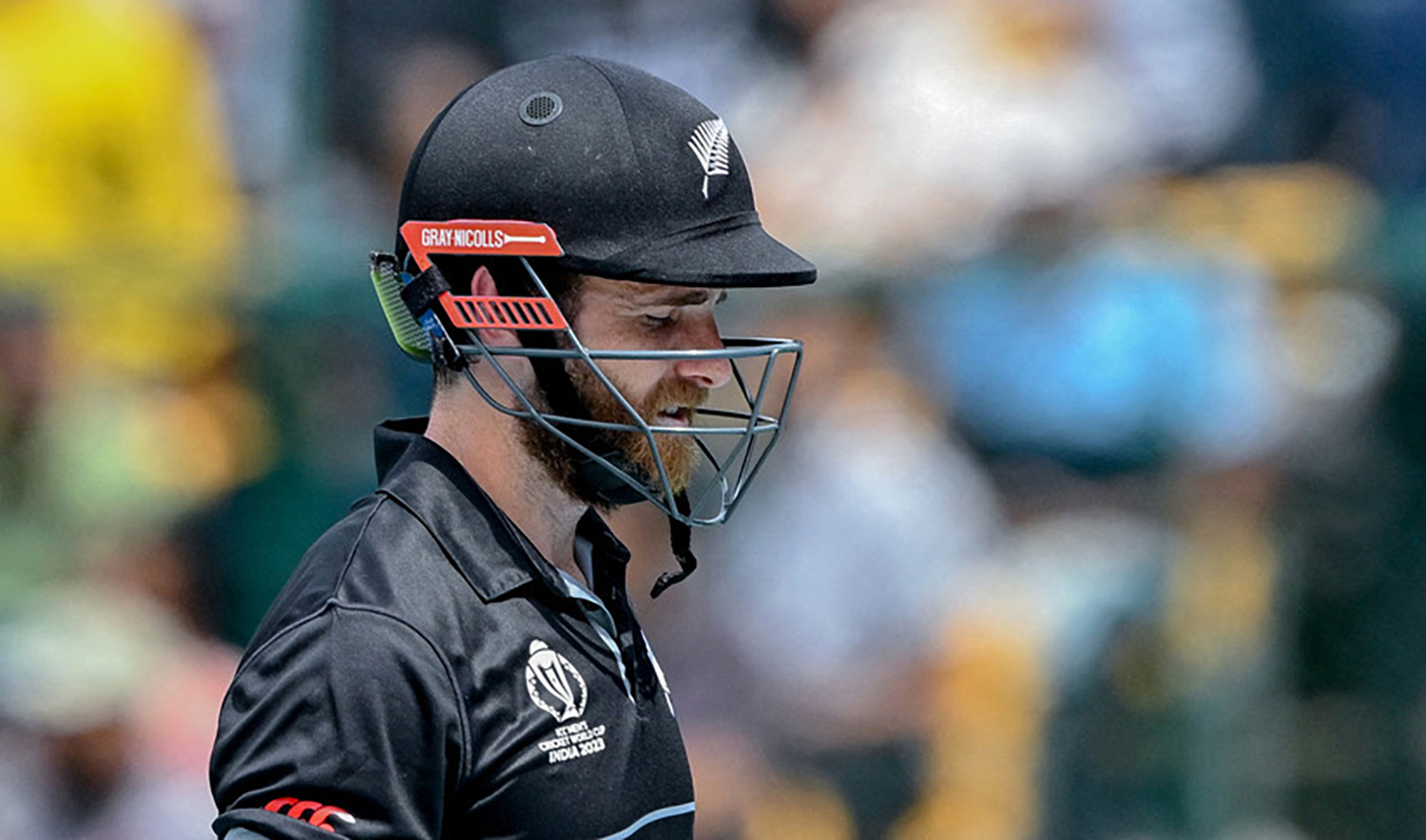 New Zealand's captain Kane Williamson gestures as he walks back to the pavilion after his dismissal during the 2023 ICC Men's Cricket World Cup one-day international (ODI) match at the M. Chinnaswamy Stadium in Bengaluru on November 4, 2023. (AFP)