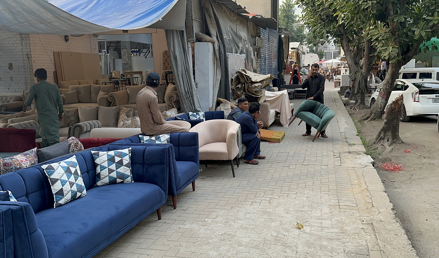 In this picture, taken on November 8, 2023, carpenters work at the Abbas Market in Islamabad. (AN photo)