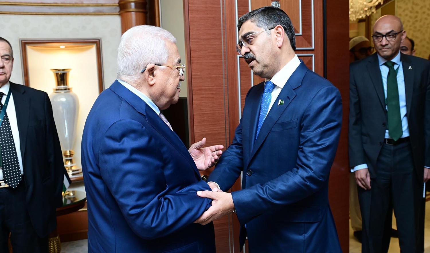 Pakistan's caretaker prime minister Anwaar-ul-Hag Kakar meets President of Palestine Mahmoud Abbas on the sidelines of the 8th extraordinary Summit of the OIC in Riyadh, Saudi Arabia on November 10, 2023. (PID)
