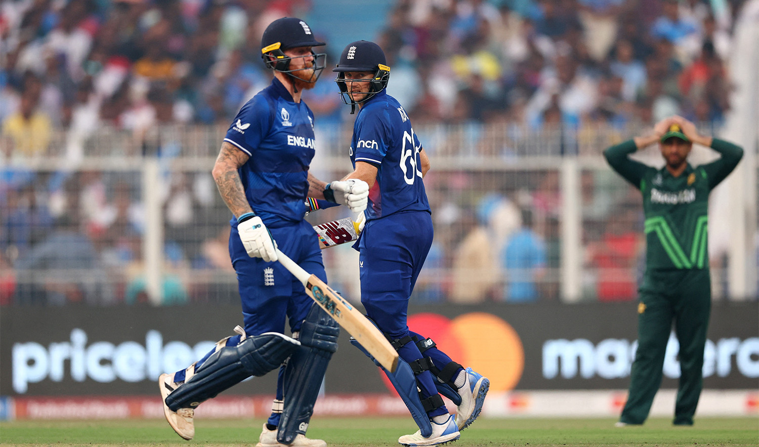 England's Ben Stokes and Joe Root in action during their ICC Cricket World Cup 2023 match against Pakistan at Eden Gardens in Kolkata, India on November 11, 2023. (REUTERS)