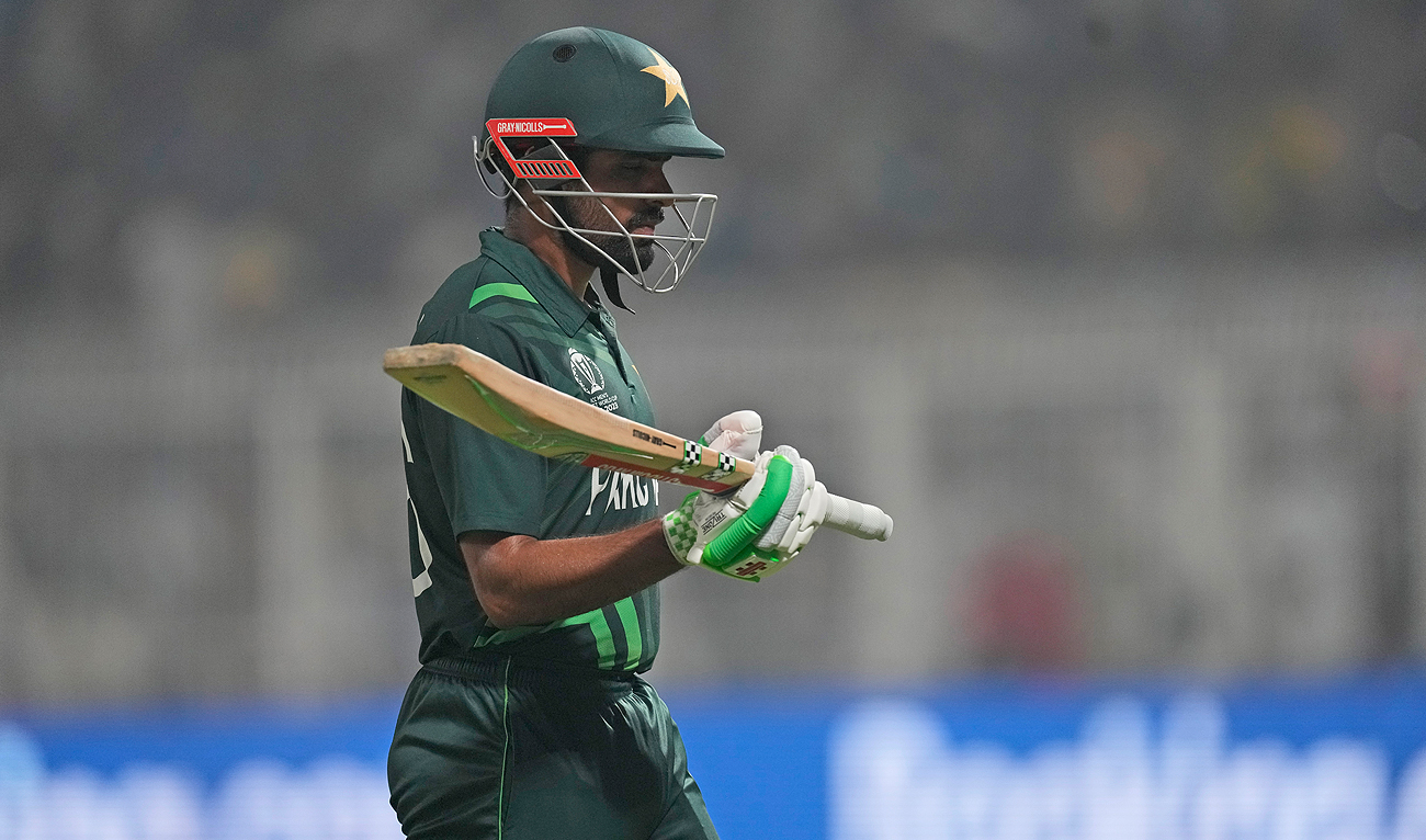 Pakistan's captain Babar Azam leaves the field after being dismissed during the ICC Men's Cricket World Cup match between Pakistan and England in Kolkata, India, Saturday, Nov. 11, 2023. (AP)