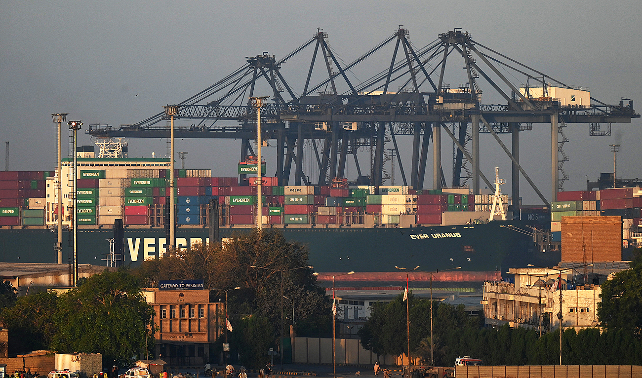 In this file photo, taken on April 6, 2023, shipping containers are seen stacked on a ship at a seaport in Karachi. (AFP/File)