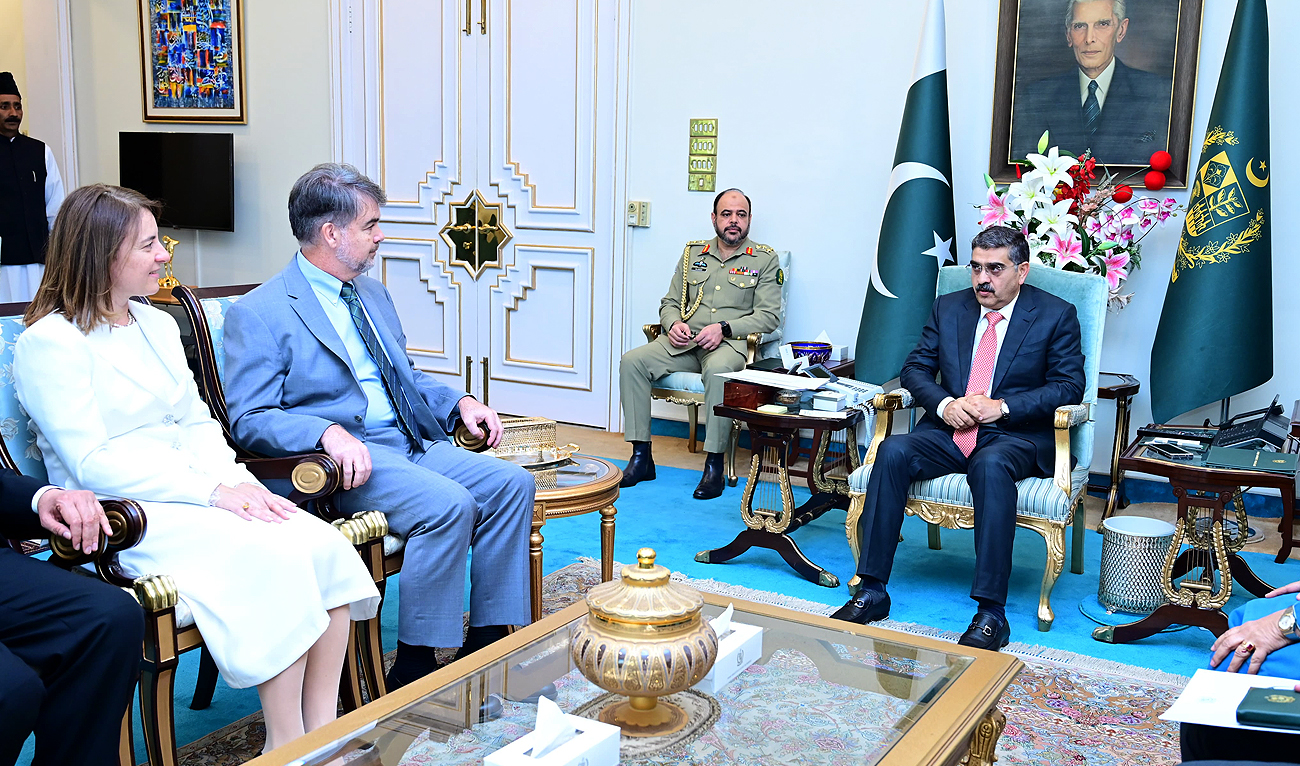 The International Monetary Fund (IMF) Mission Chief for Pakistan Nathan Porter (2nd left) and IMF Resident Representative for Pakistan Esther Perez Tuiz (left) meet Pakistan Caretaker Prime Minister Anwaar-ul-Haq Kakar in Islamabad on November 15, 2023. (Photo courtesy: PMO)