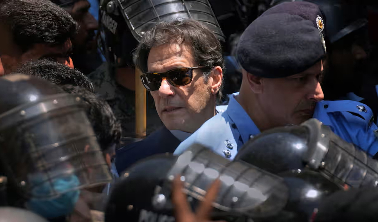 Security officers escort Pakistani former Prime Minister Imran Khan as he appeared in Islamabad High Court, Islamabad, Pakistan, May 12, 2023. (AP/File)