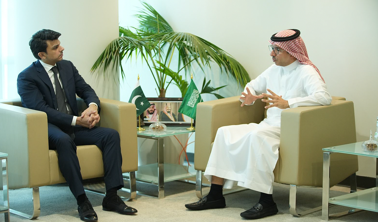 This handout photo, taken and released by Pakistan's Press Information Department, shows Special Assistant to the Prime Minister on Overseas Pakistanis and Human Resource Development, Jawad Sohrab Malik, during a meeting with the Saudi Minister for Human Resources and Social Development Dr. Abdullah Nasser Abu Thnain in Riyadh on November 21, 2023. (Photo courtesy: PID)