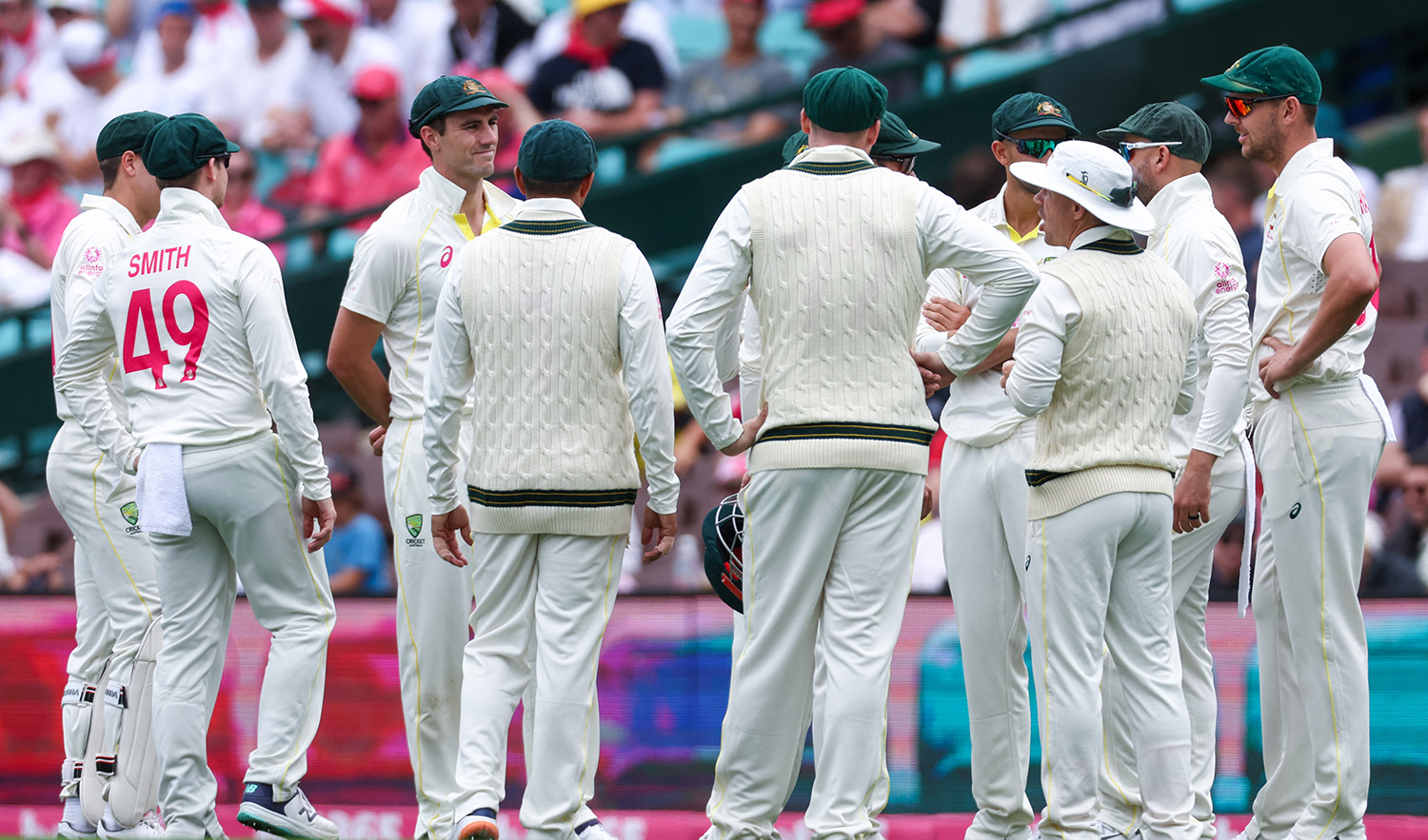Australian captain Pat Cummins (C) stands with teammates before the start of play during the third cricket Test match between Australia and South Africa at the Sydney Cricket Ground (SCG) in Sydney on January 7, 2023. (AFP/File)