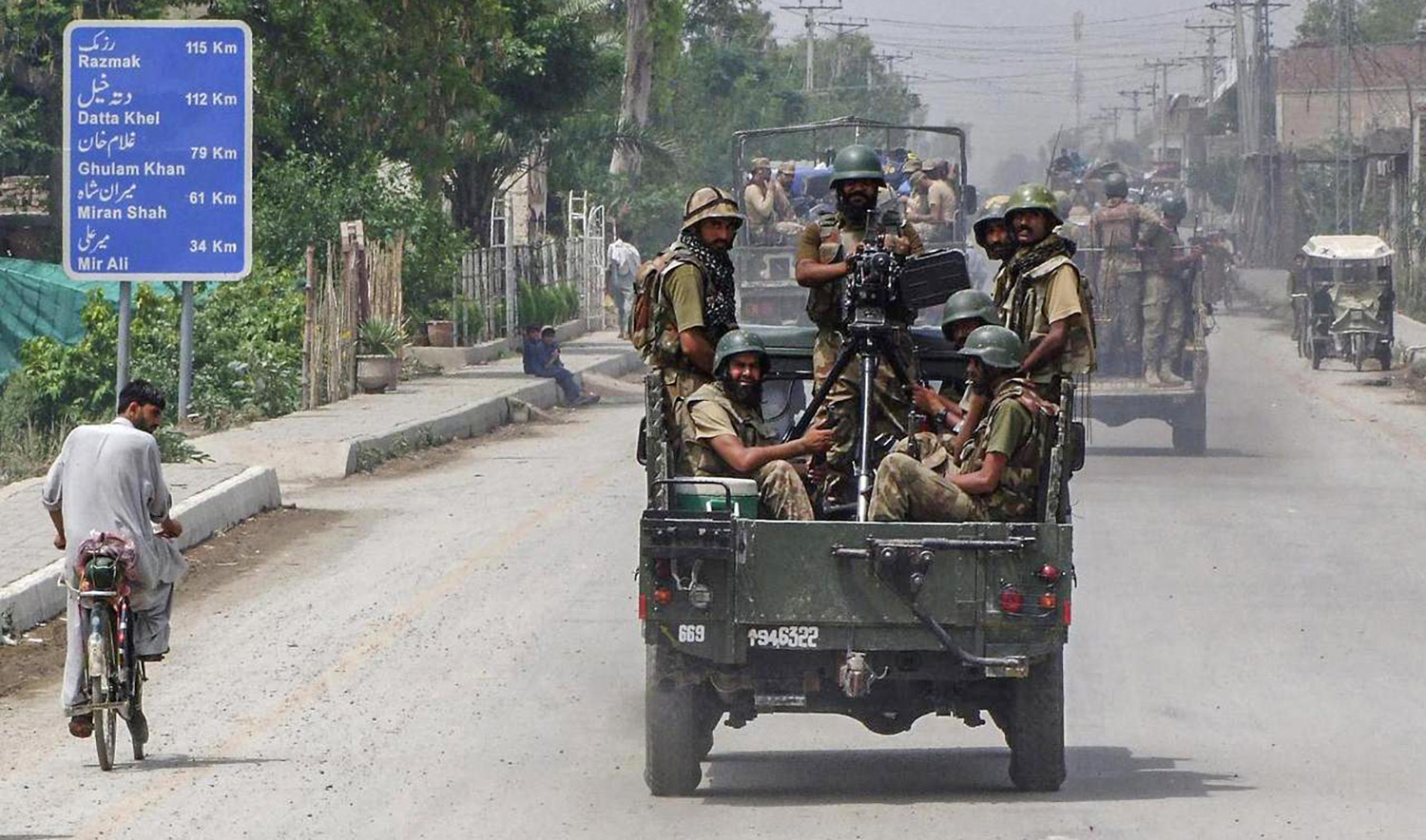 Pakistani soldiers drive toward North Waziristan from Bannu on June 20, 2014. (REUTERS/File)