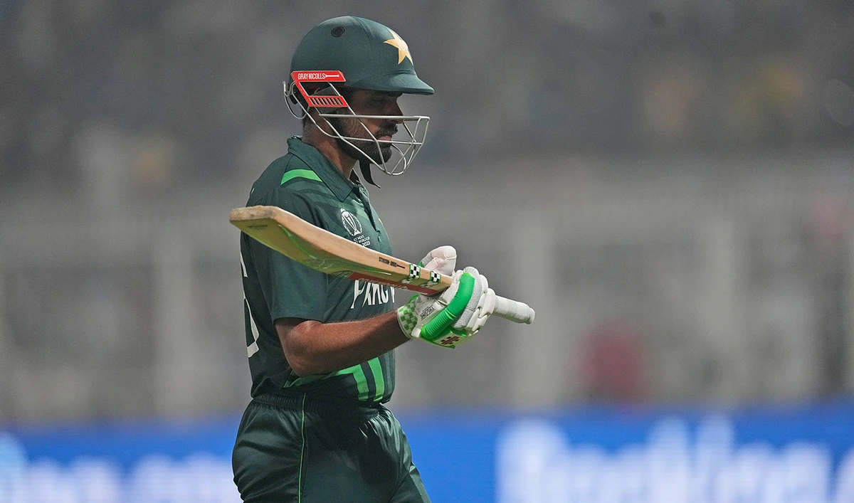 Pakistan's captain Babar Azam leaves the field after being dismissed during the ICC Men's Cricket World Cup match between Pakistan and England in Kolkata, India, Saturday, Nov. 11, 2023. (AP)