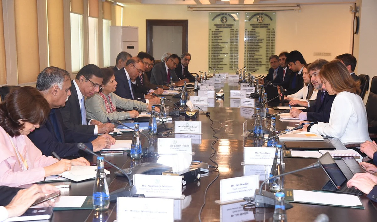 Pakistan’s Caretaker Finance Minister Dr. Shamshad Akhtar (4L) attends a meeting with an International Monetary Fund (IMF) review mission led by IMF mission official Nathan Porter (2R) at the Finance Ministry in Islamabad on November 2, 2023. (Photo courtesy: Press Information Department)