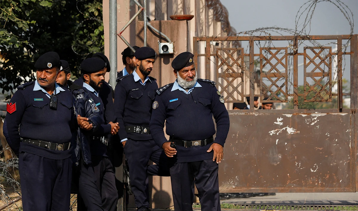 Police officers stand at the entrance of the district Judicial Complex in Islamabad, Pakistan November 28, 2023. (REUTERS)
